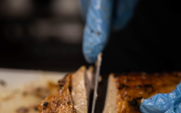 U.S. Marines, prepare Thanksgiving meal for Marines, Sailors while on European deployment