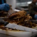 U.S. Marines, prepare Thanksgiving meal for Marines, Sailors while on European deployment
