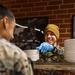 U.S. Marines and Sailors, celebrate a Thanksgiving meal while on European deployment