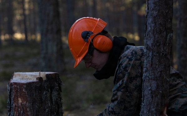 U.S. Marines with MWSS-273 and CLB-6 participate in tree falling operations