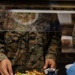 U.S. Marines and Sailors, celebrate a Thanksgiving meal while on European deployment