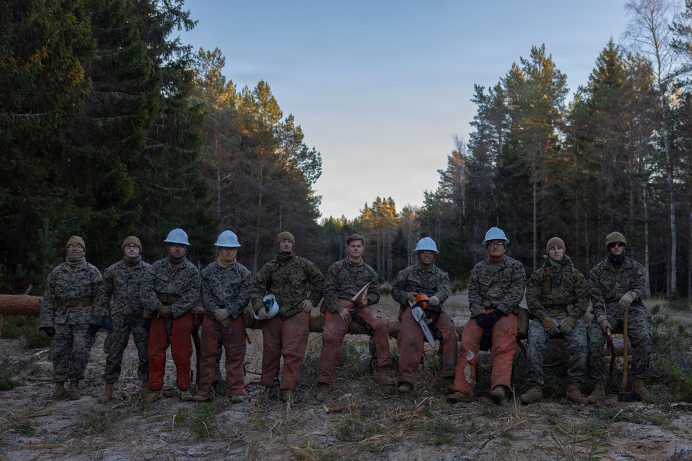 U.S. Marines with MWSS-273 and CLB-6 participate in tree falling operations