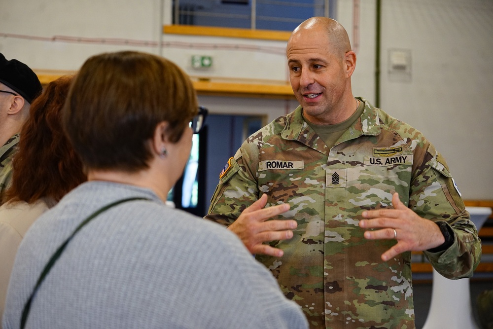 Romar Takes Responsibility as Garrison Sets Path for Poland School-Age Dependent Tours