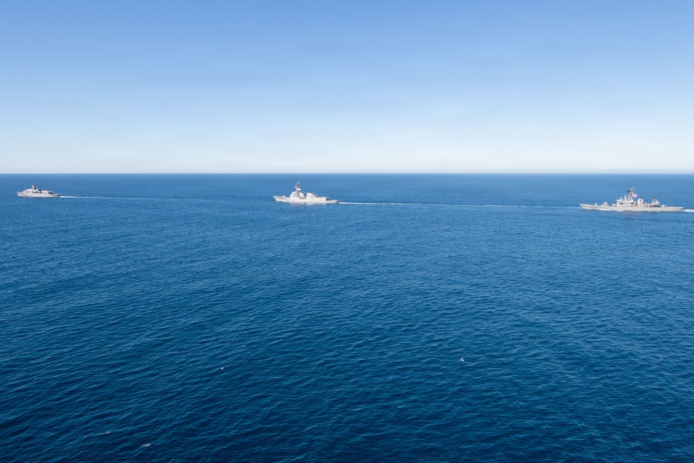 USS Jack H. Lucas (DDG 125) sails alongside Japan Maritime Self-Defense Force