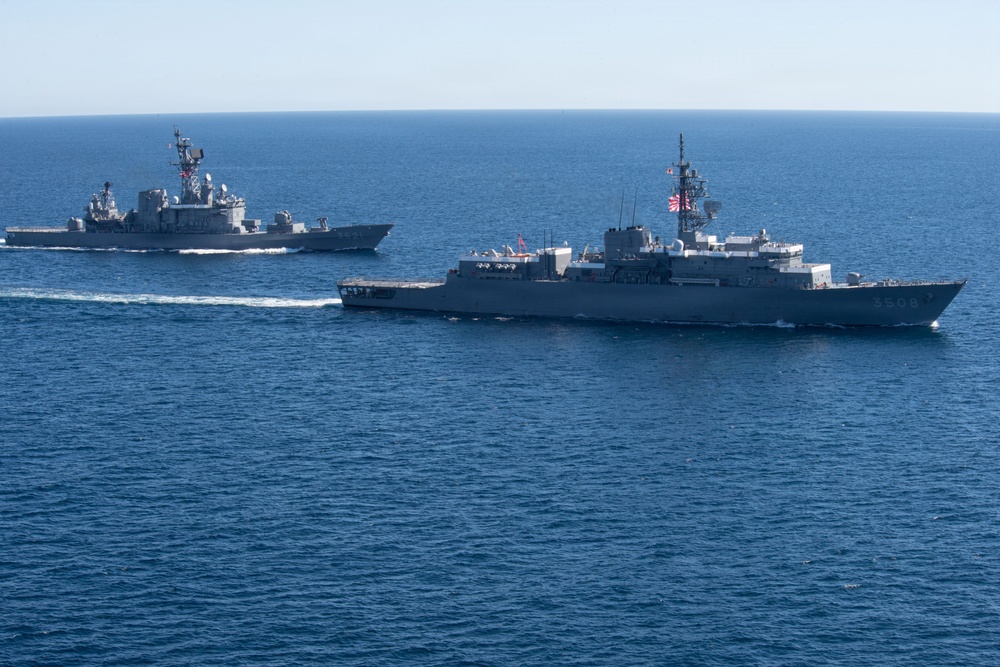 USS Jack H. Lucas (DDG 125) sails alongside Japan Maritime Self-Defense Force