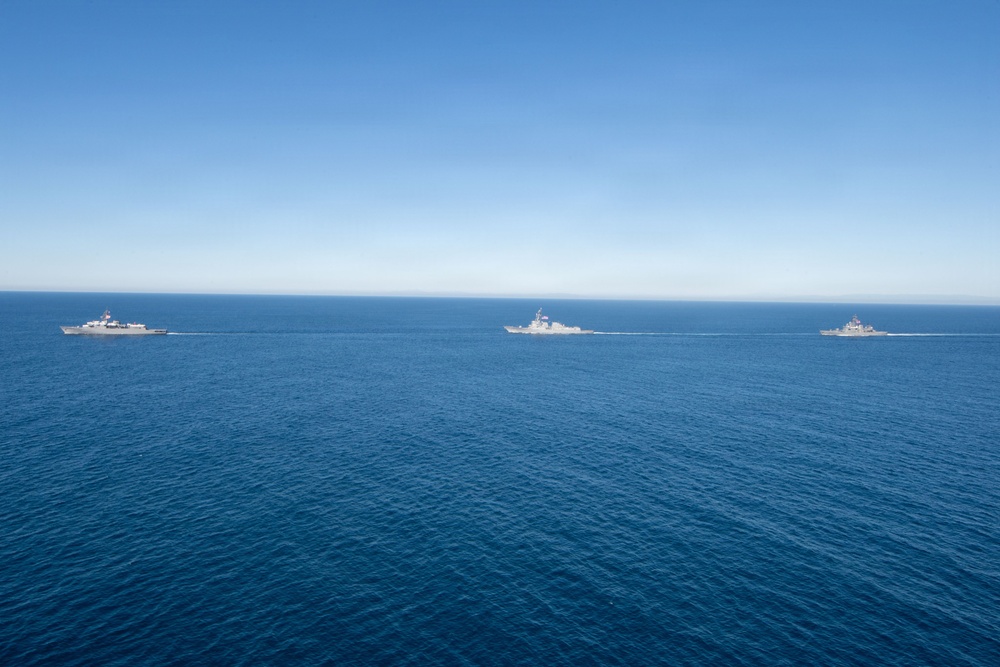 USS Jack H. Lucas (DDG 125) sails alongside Japan Maritime Self-Defense Force