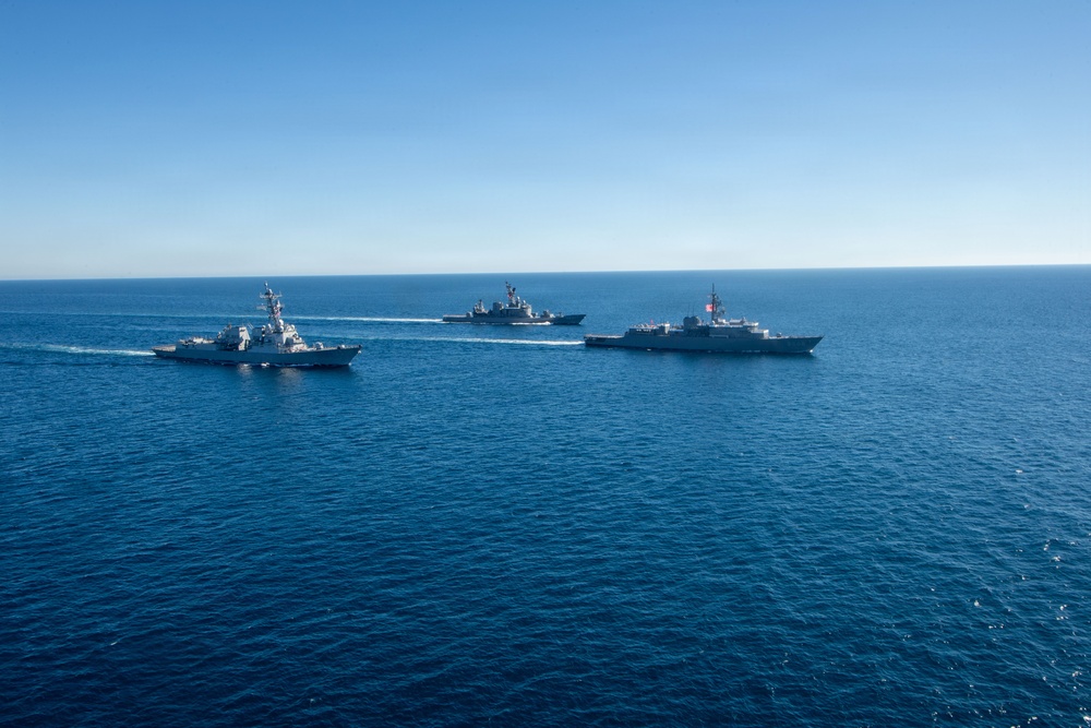 USS Jack H. Lucas (DDG 125) sails alongside Japan Maritime Self-Defense Force