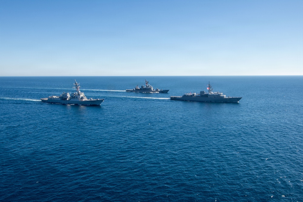 USS Jack H. Lucas (DDG 125) sails alongside Japan Maritime Self-Defense Force