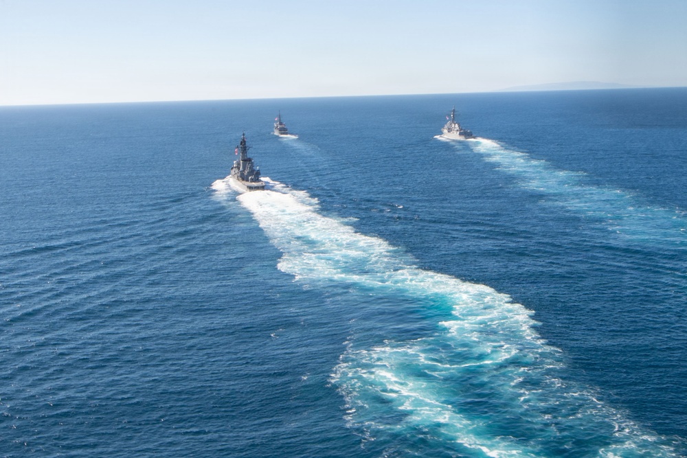 USS Jack H. Lucas (DDG 125) sails alongside Japan Maritime Self-Defense Force