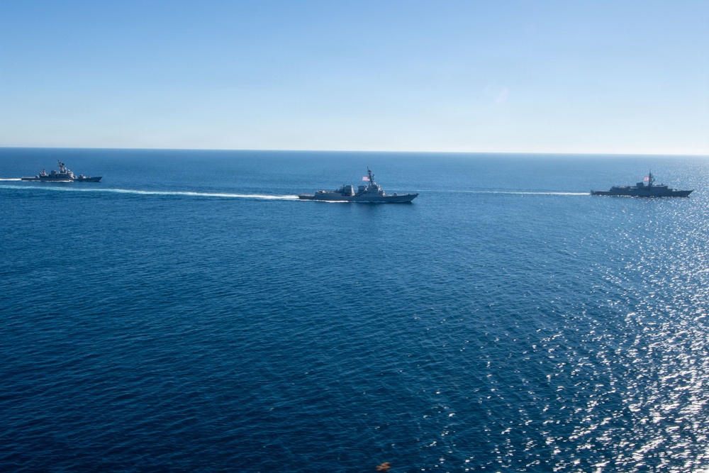 USS Jack H. Lucas (DDG 125) sails alongside Japan Maritime Self-Defense Force