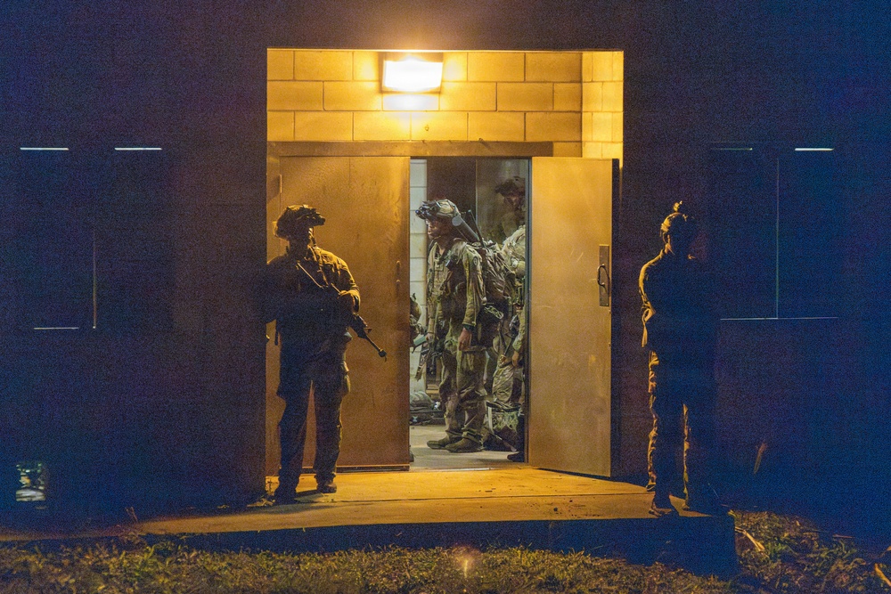 Soldiers guard field clinic