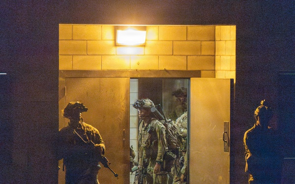 Soldiers guard field clinic