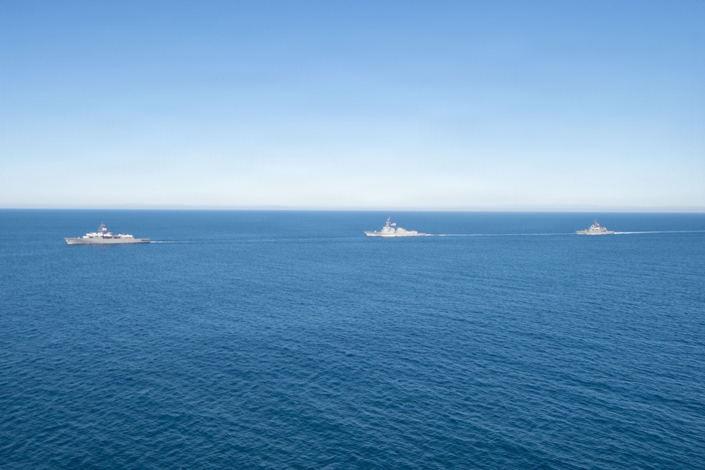 USS Jack H. Lucas (DDG 125) sails alongside Japan Maritime Self-Defense Force