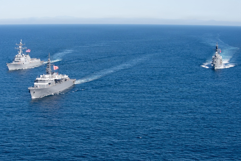 USS Jack H. Lucas (DDG 125) sails alongside Japan Maritime Self-Defense Force