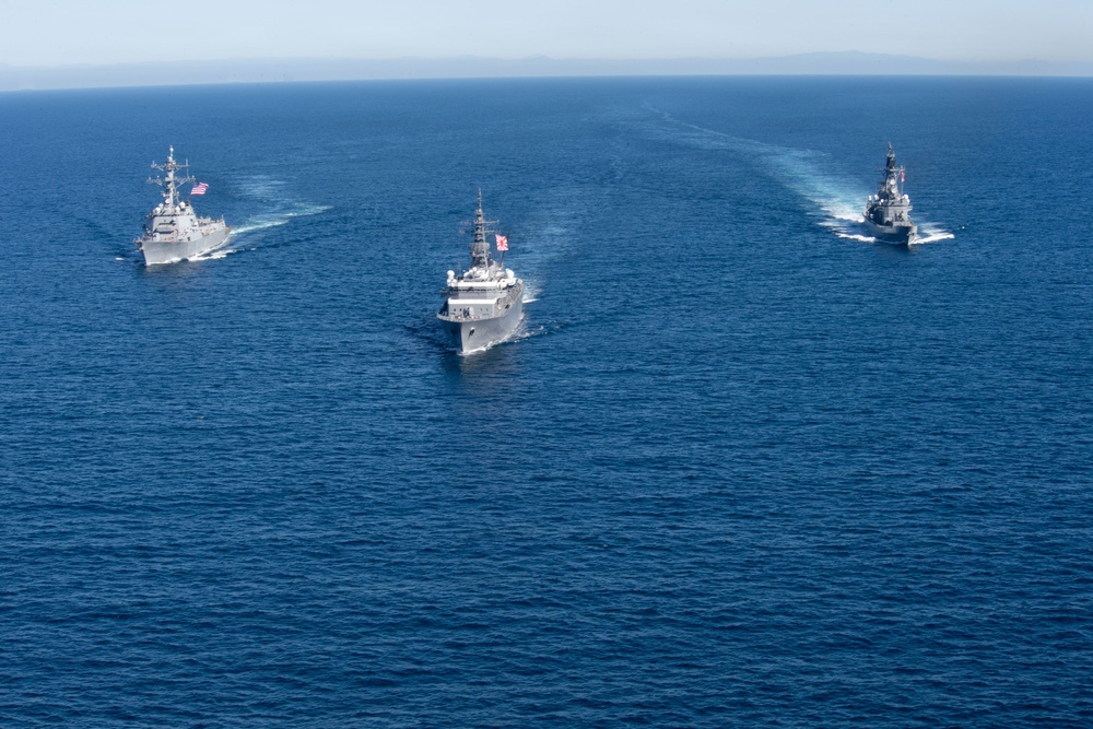 USS Jack H. Lucas (DDG 125) sails alongside Japan Maritime Self-Defense Force