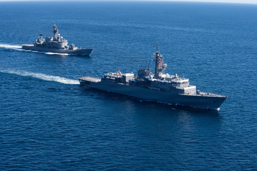 USS Jack H. Lucas (DDG 125) sails alongside Japan Maritime Self-Defense Force
