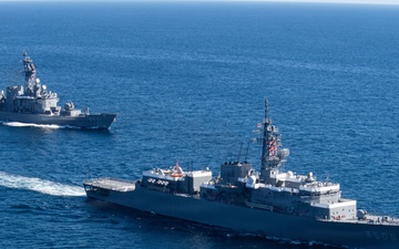 USS Jack H. Lucas (DDG 125) sails alongside Japan Maritime Self-Defense Force