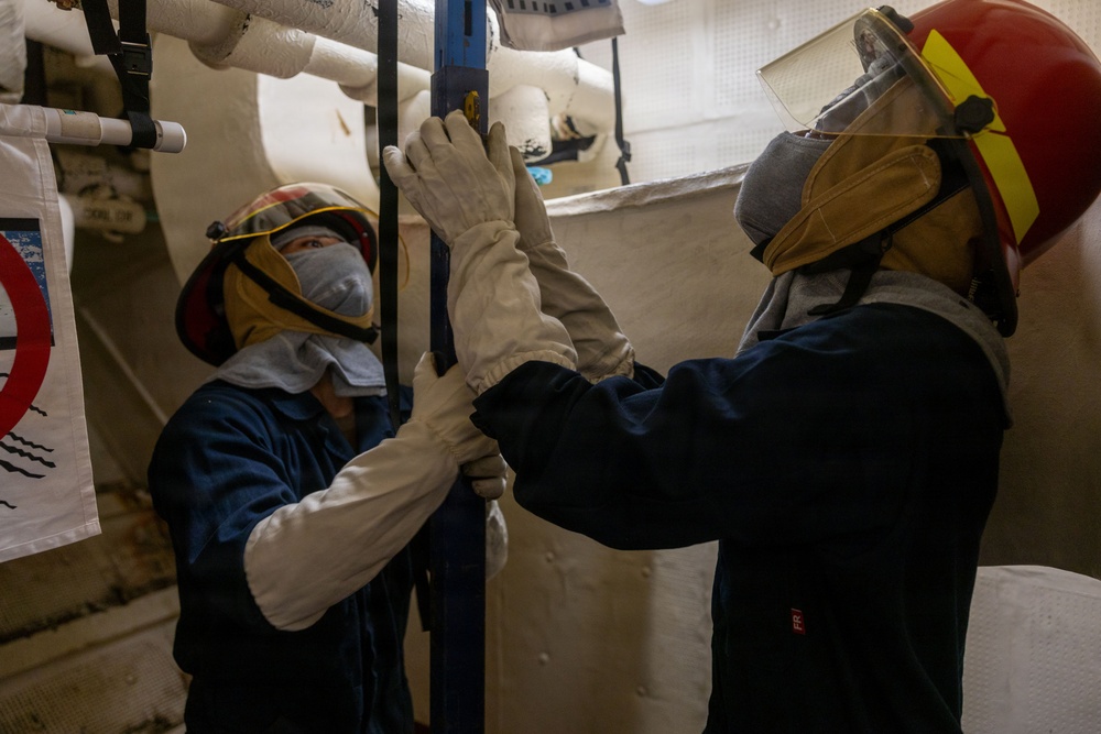 USS Iwo Jima Sailors Conduct a Damage Control Training Evolution