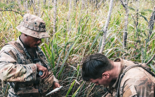 Soldiers plot points on map