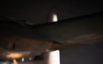 South Dakota Army National Guard soldier Sgt. Bryce Muirhead, waits patiently to board a C-130J Super Hercules
