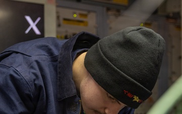 USS Gerald R. Ford (CVN 78) Sailor Conducts Routine Maintnance