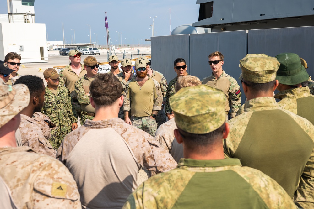 Coalition forces conduct close quarters combat training during Exercise Ferocious Falcon 6