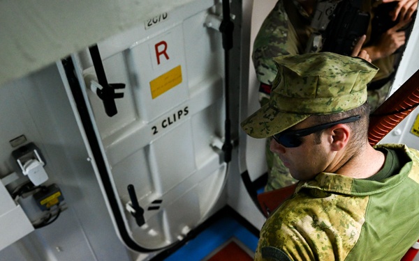 Coalition forces conduct close quarters combat training during Exercise Ferocious Falcon 6