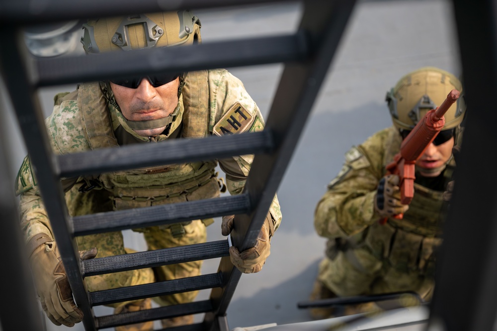 Coalition forces conduct close quarters combat training during Exercise Ferocious Falcon 6