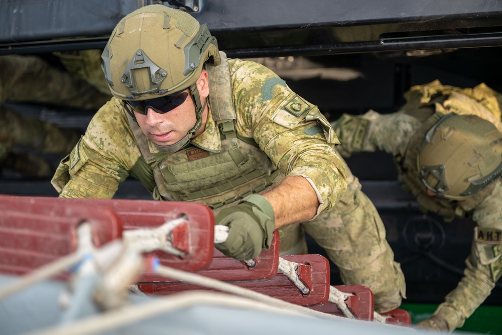 Coalition forces conduct close quarters combat training during Exercise Ferocious Falcon 6