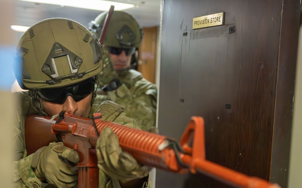 Coalition forces conduct close quarters combat training during Exercise Ferocious Falcon 6