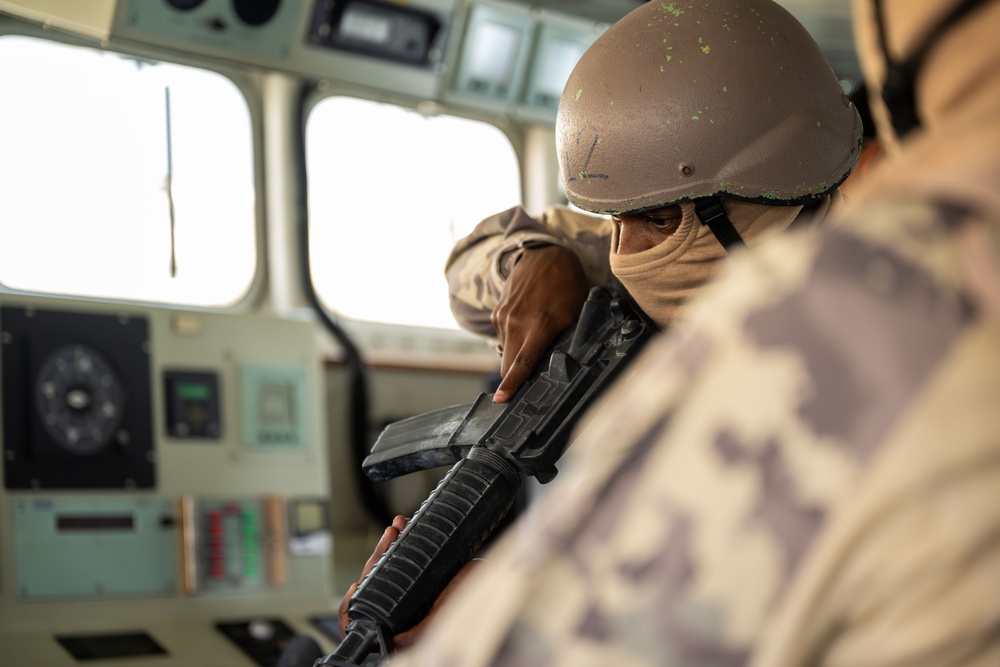 Coalition forces conduct close quarters combat training during Exercise Ferocious Falcon 6