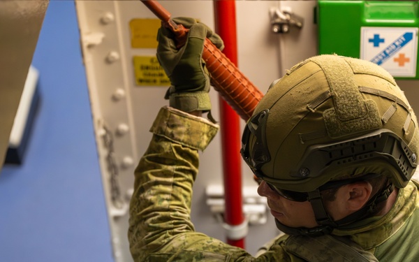 Coalition forces conduct close quarters combat training during Exercise Ferocious Falcon 6