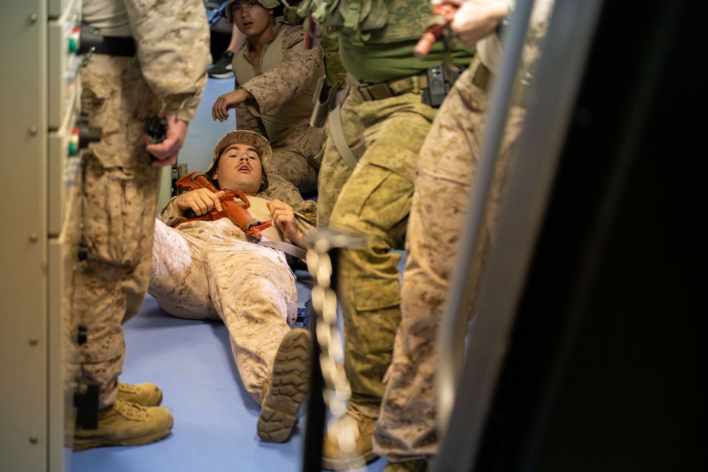 Coalition forces conduct close quarters combat training during Exercise Ferocious Falcon 6