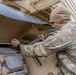 U.S. Army Soldier performs maintenance on an M1 Abrams