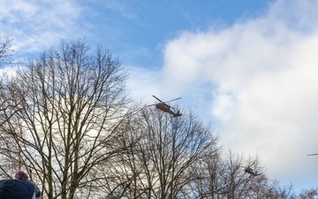 U.S. Army UH-60 Blackhawks fly over Latvia’s Independence Day parade