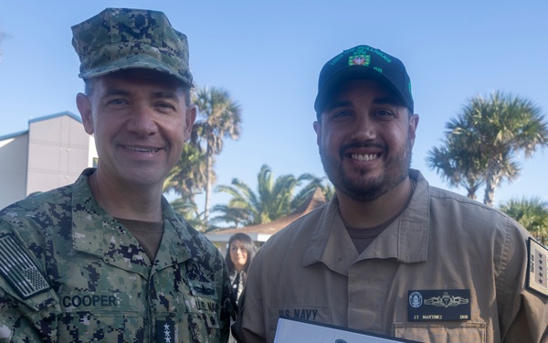Adm. Brad Cooper, Presents Joint Awards with “R” Device to USS The Sullivans (DDG 68)
