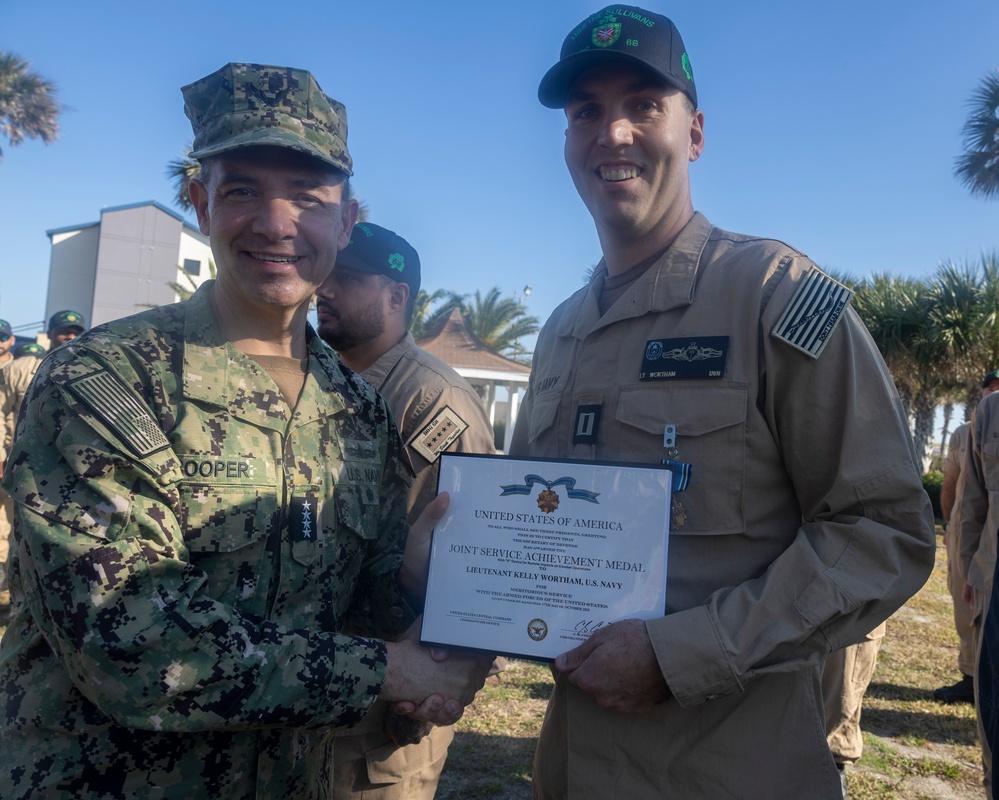 Adm. Brad Cooper, Presents Joint Awards with “R” Device to USS The Sullivans (DDG 68)