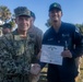 Adm. Brad Cooper, Presents Joint Awards with “R” Device to USS The Sullivans (DDG 68)