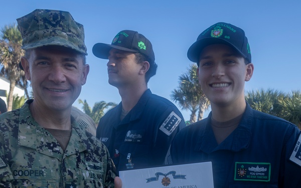 Adm. Brad Cooper, Presents Joint Awards with “R” Device to USS The Sullivans (DDG 68)