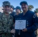 Adm. Brad Cooper, Presents Joint Awards with “R” Device to USS The Sullivans (DDG 68)
