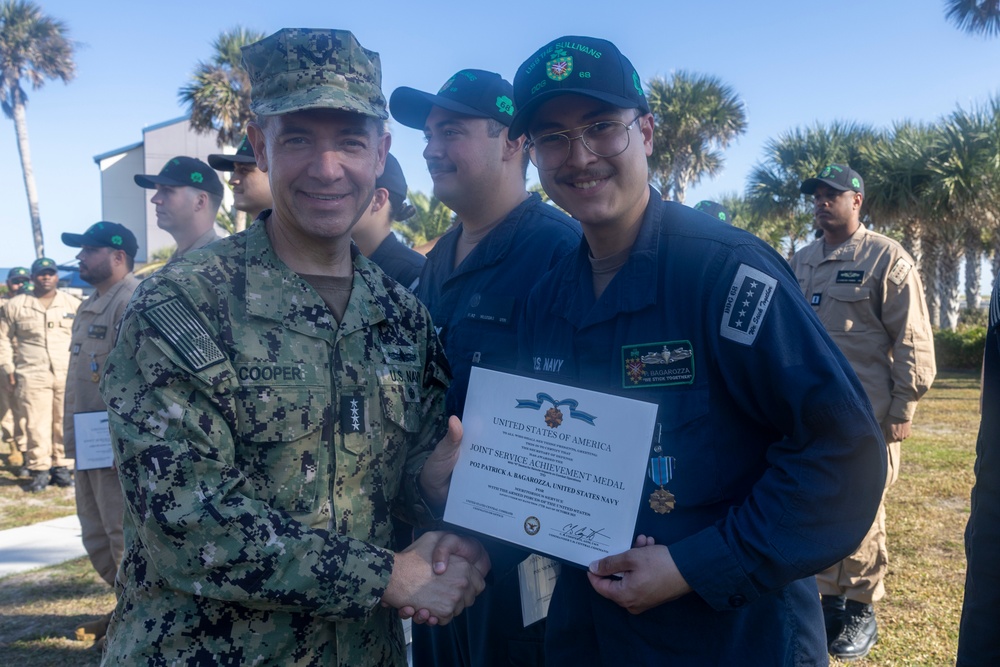 Adm. Brad Cooper, Presents Joint Awards with “R” Device to USS The Sullivans (DDG 68)