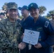 Adm. Brad Cooper, Presents Joint Awards with “R” Device to USS The Sullivans (DDG 68)