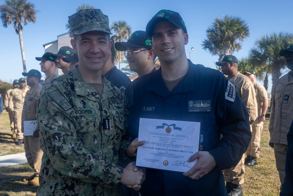 Adm. Brad Cooper, Presents Joint Awards with “R” Device to USS The Sullivans (DDG 68)