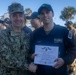 Adm. Brad Cooper, Presents Joint Awards with “R” Device to USS The Sullivans (DDG 68)