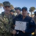 Adm. Brad Cooper, Presents Joint Awards with “R” Device to USS The Sullivans (DDG 68)