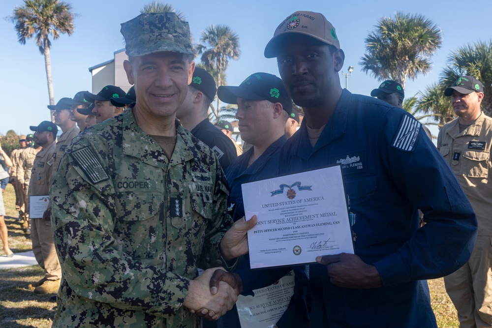 Adm. Brad Cooper, Presents Joint Awards with “R” Device to USS The Sullivans (DDG 68)