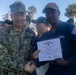 Adm. Brad Cooper, Presents Joint Awards with “R” Device to USS The Sullivans (DDG 68)