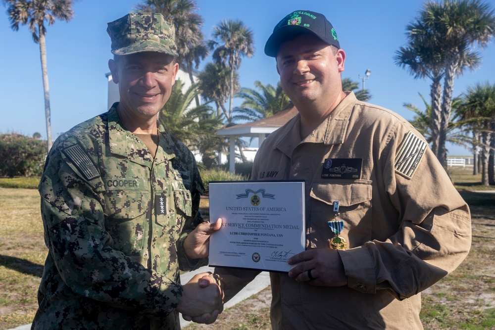 Adm. Brad Cooper, Presents Joint Awards with “R” Device to USS The Sullivans (DDG 68)