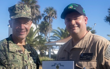 Adm. Brad Cooper, Presents Joint Awards with “R” Device to USS The Sullivans (DDG 68)