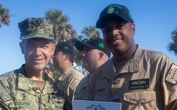Adm. Brad Cooper, Presents Joint Awards with “R” Device to USS The Sullivans (DDG 68)
